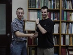 John and Chase displaying certificate.