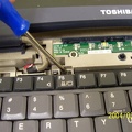 Remove the screws from the top of the keyboard.