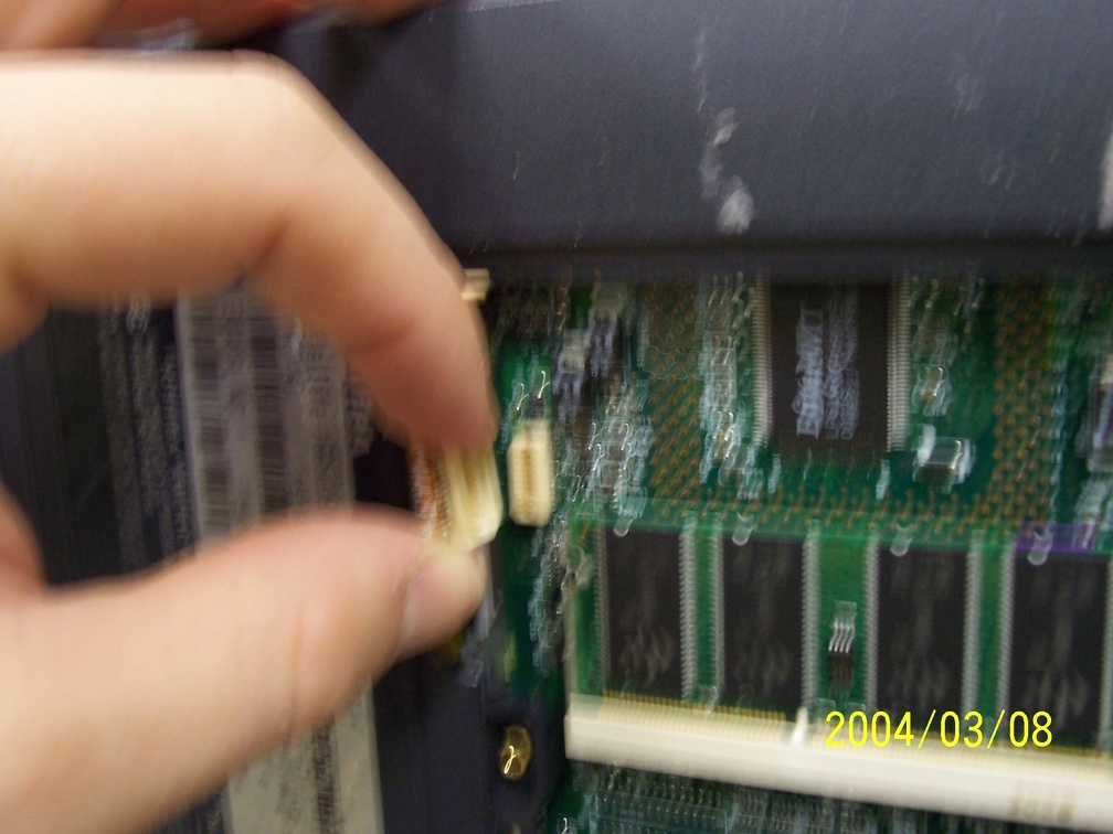 During all this, I had somehow disconnected the 3.5" floppy.  This cable connects underneath where the ram is.  That's a 12