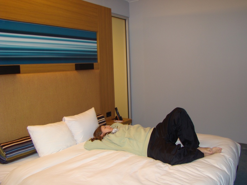 me flopped on the nice comfy king sized bed at the Aloft hotel in Baltimore