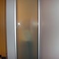 the opaque window between the shower and bedroom....u can see the outline of me through it and yes i have clothes on!