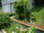 Flower bed and batcave (yourtech)